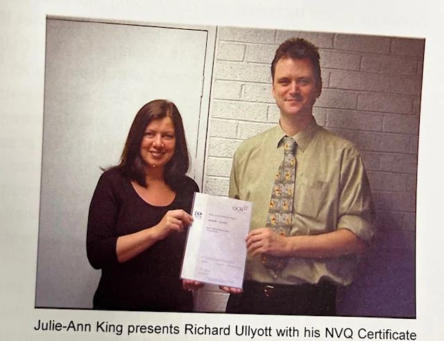 Julie-Ann King presenting Richard Ullyott with his NVQ certificate in 2005