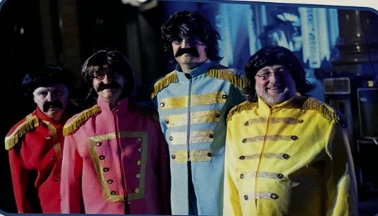 NWUPC colleagues in Beatles-inspired costumes at COUP 2013 in Liverpool